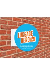 Round Flange Sign showing Luggage Hero artwork